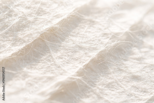 Close-up texture of white fabric with soft fibers and details