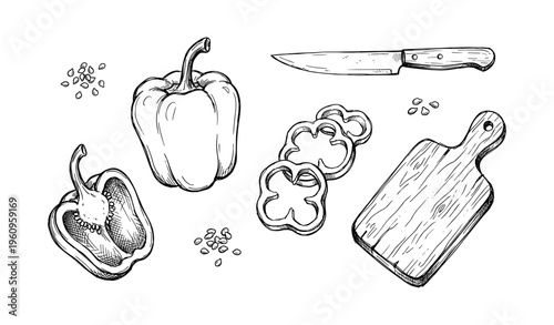 Black and white bell pepper slices and knife on cutting board