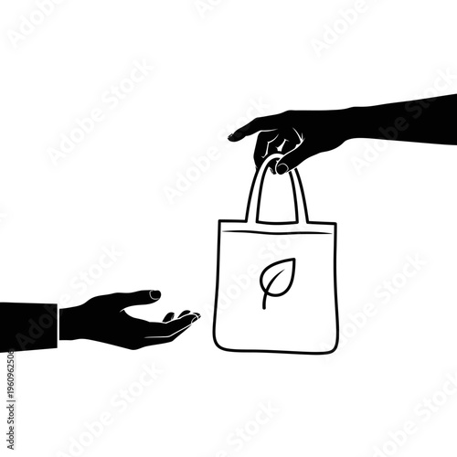 Hand holding eco friendly shopping bag.