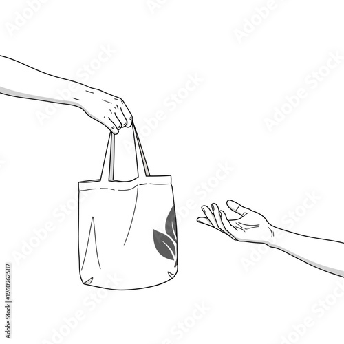 Hands passing a shopping bag.