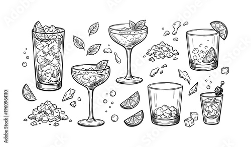 Assortment of cocktail glasses with ice cubes and citrus slices