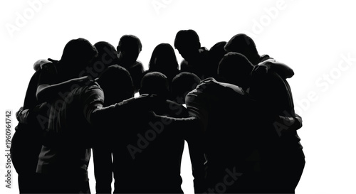 silhouette of diverse group of people huddled together