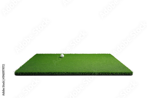 Golf ball resting on green grass turf square