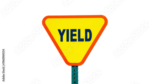 фотографія Isolated yellow yield traffic sign on a green metal post, clear bright road safety symbol