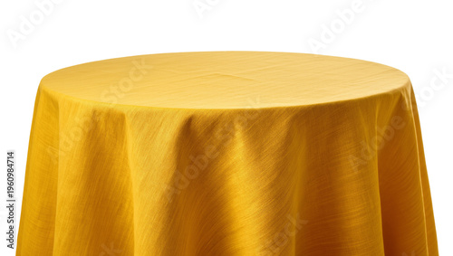 Isolated vibrant yellow tablecloth draped over round table for event decor or dining