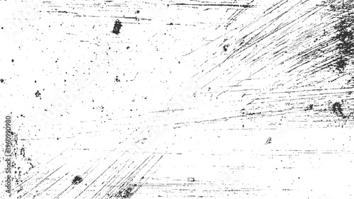 Black ink splatters and scratches on a white textured background abstract