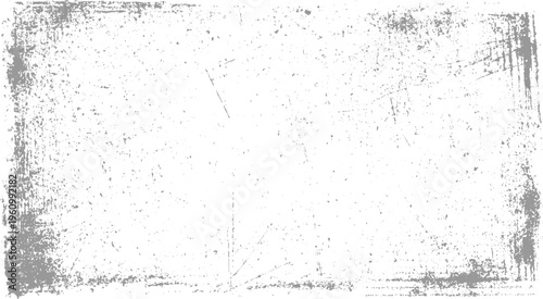 Grungy distressed white background with grey scratches and speckles grunge