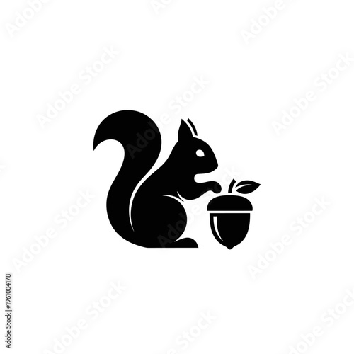 Black and white silhouette of a squirrel holding an acorn on white background