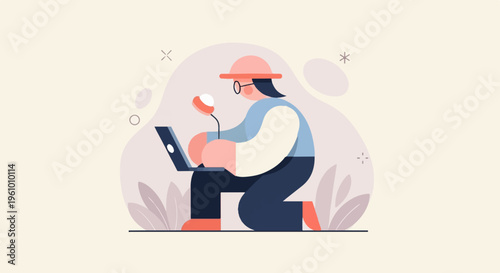 Person in hat using laptop and flower