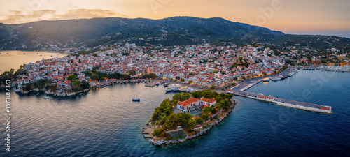 Panoramic aerial view of the town of Skiathos island, Sporades, Greece, during summer sunset time