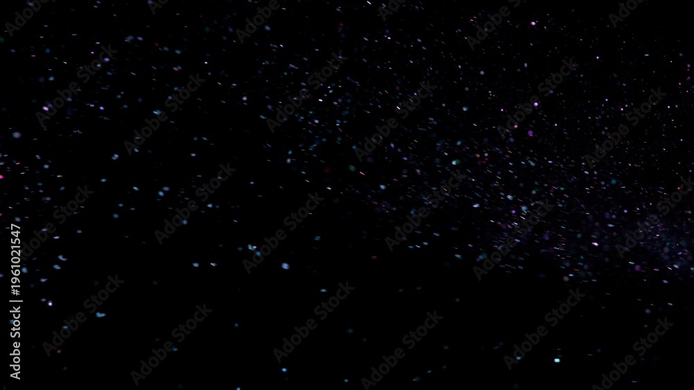 Fototapeta premium Freeze Motion Shot of Color Glitter Background Isolated on Black