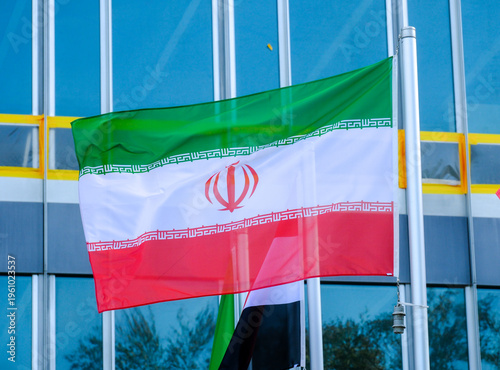 Iran flag in front of the World Health Organization (WHO)