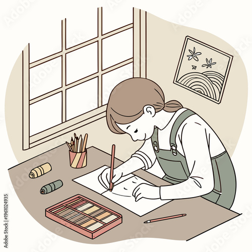 A woman sitting at a desk drawing with a pencil
