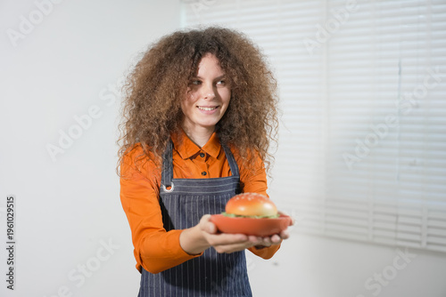 A female model is posing in a studio against a white backdrop, displaying various expressions such as showing a credit card, laughing, crying, feeling happy, surprised, playing sports, and more.