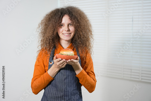 A female model is posing in a studio against a white backdrop, displaying various expressions such as showing a credit card, laughing, crying, feeling happy, surprised, playing sports, and more.