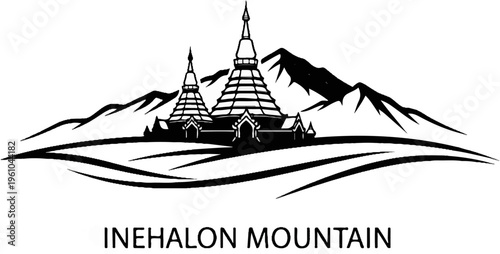 Iconic twin pagodas stand against dramatic mountain peaks