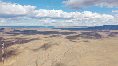Aerial view of a dry desert mountain landscape