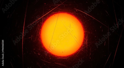Abstract Glowing Orange Circle on Dark Background with Scratches.