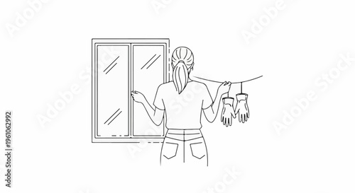 Person hanging laundry, gloves drying on a line near window
