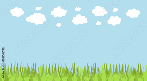 Sunny day landscape with green field and white fluffy clouds in blue sky. Clear nature background with copy space for environmental and education projects.