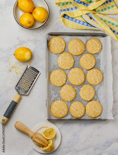 Freshly baked lemon cookies with icing sugar. Fresh homemade pastry. Selective focus