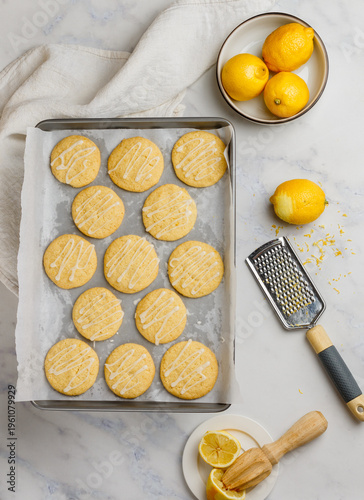 Freshly baked lemon cookies with icing sugar. Fresh homemade pastry. Selective focus