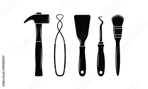 Classic hand tools and painting supplies depicted in black and white silhouette style