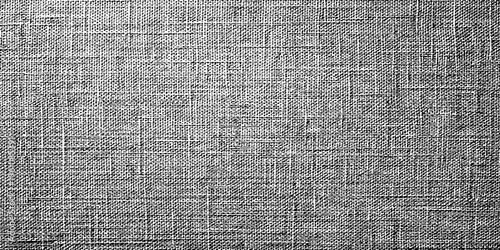 Vintage old paper and abstract canvas texture background with a rough natural fiber pattern featuring beige linen and brown burlap material for a weathered textile surface