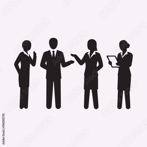 Team of diverse business professionals standing and discussing.