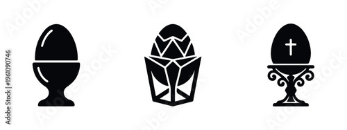 Set of three black Easter egg icons in various styles: classic, geometric, and decorative with a cross. Isolated on a white background.