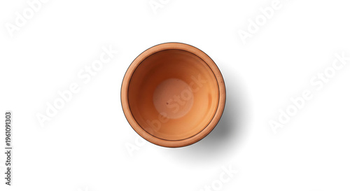 A terracotta pot sits empty on a white background, casting a subtle shadow.