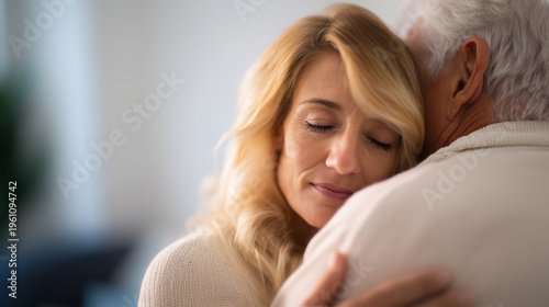 Close-up family embrace with senior father and adult daughter, comfort, emotional support, care, realistic lifestyle scene .ultra realistic close-up lifestyle scene of an elderly m