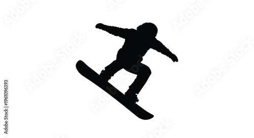 Silhouette of a snowboarder performing a trick in mid air