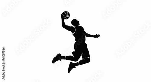 Silhouette of a basketball player in mid-air dunking