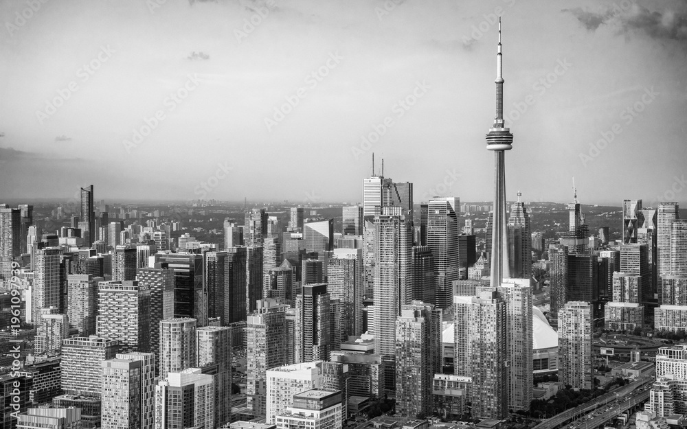 Fototapeta premium Helicopter Perspective. Toronto Skyline Bathed in Sunset Glow