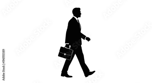 Businessman walking with briefcase in hand.
