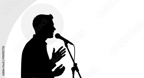 Man Speaking into Microphone Silhouette Profile.