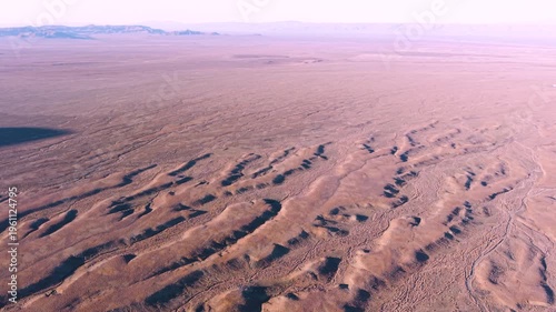 Aerial of dry landscape with erosion