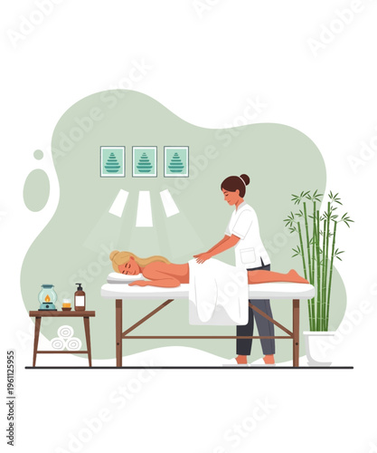 Professional massage therapist gives relaxing back treatment to a serene woman on a treatment table