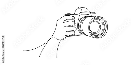 Continuous line drawing of a hand holding a digital camera for professional photography.