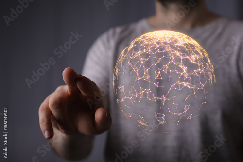A person's hand reaching to...
