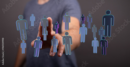 Hand reaching towards peopl...
