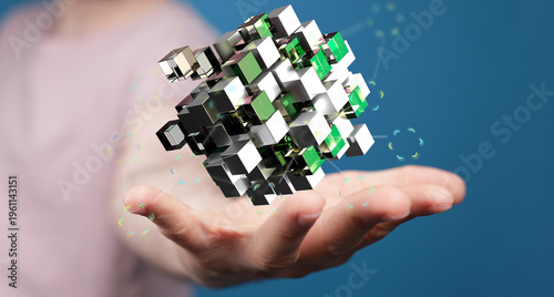 Abstract image of a person holding a 3D data cube. Concepts include technology, innovation, and digital world. Perfect f