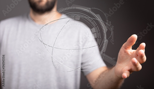 A man's hand interacting wi...