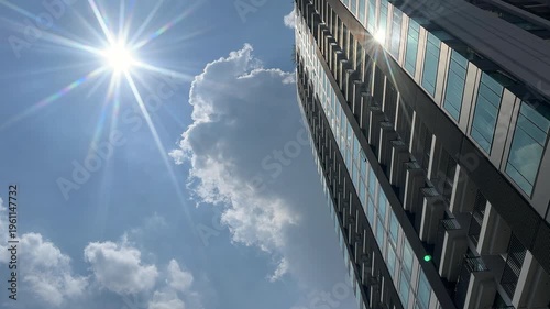 Hot Summer Sun Over Modern Skyscraper and Blue Sky, weather global warning, climate change