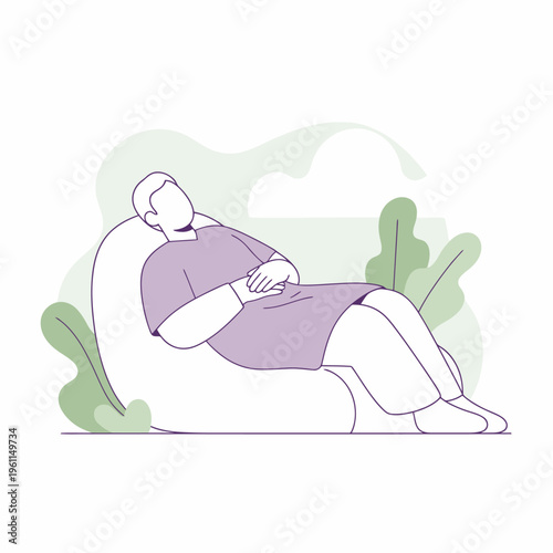 Man Relaxing on Beanbag Chair in Casual Attire.