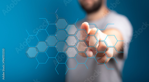 Abstract image of a person interacting with a network or digital interface. Concepts include technology, innovation, and