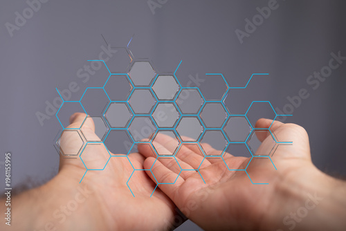 Concept of technology, digital transformation, and future. Hands supporting digital structure. Modern technology, connec