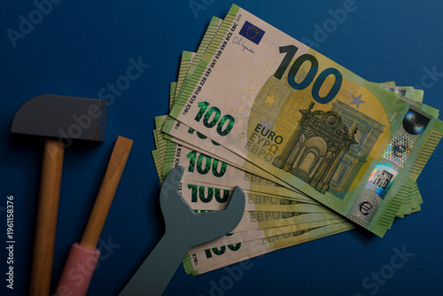 Euro banknotes next to repa...