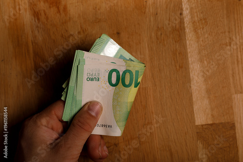 Close up of hand holding eu...